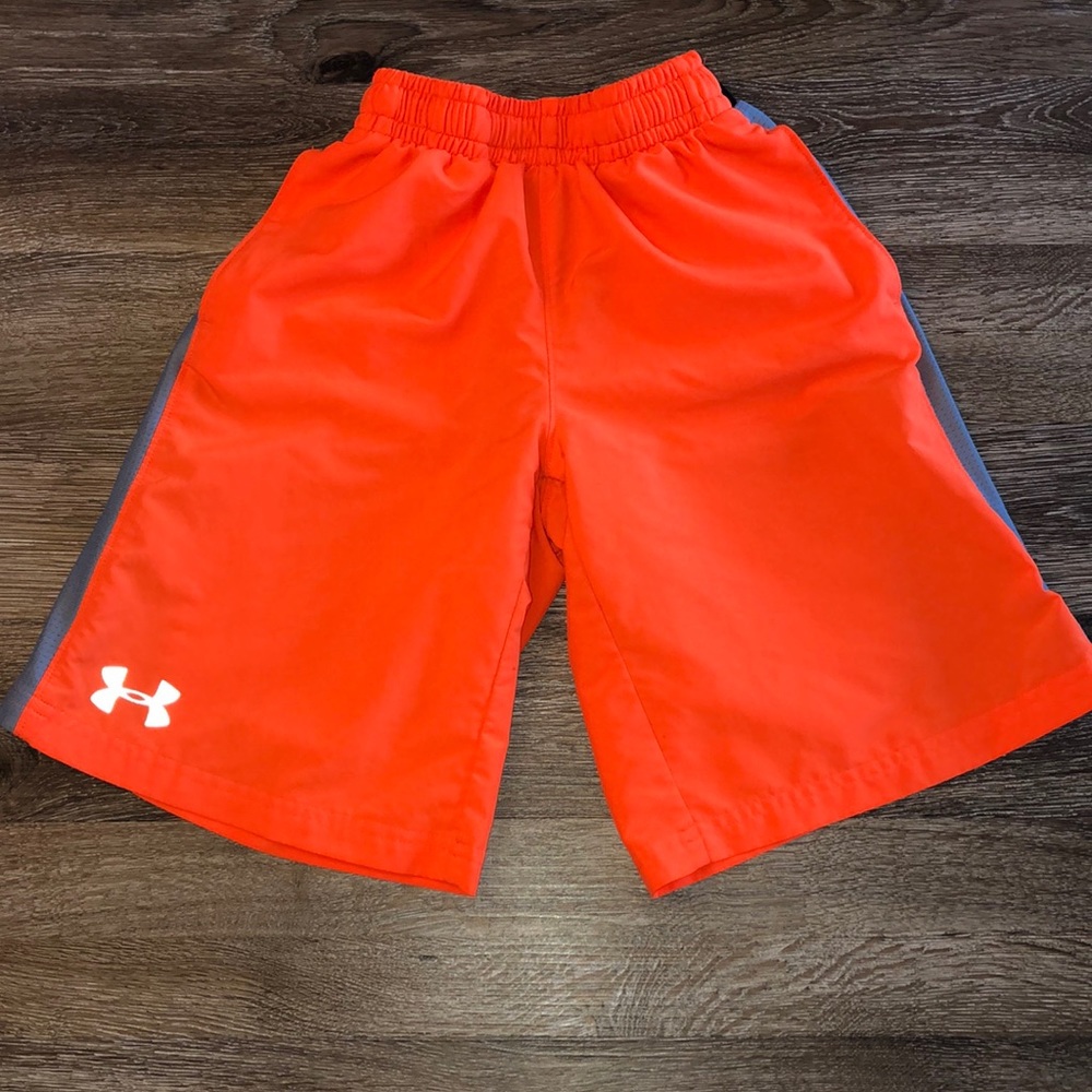 Under Armour youth small, loose fit orange shorts